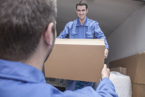Professional house removalists in Wandsworth loading furniture into a moving van
