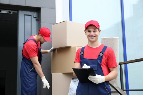 Professional team collecting old furniture from a Wandsworth property