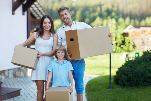 Movers preparing furniture for a Wandsworth flat relocation