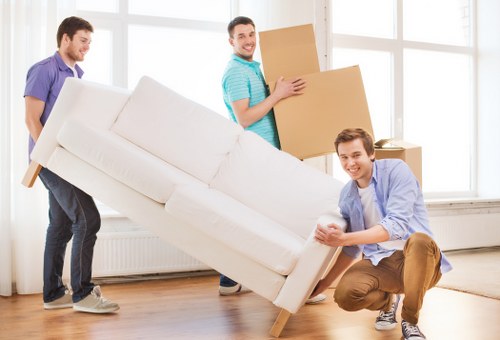 Professional student removals service in Wandsworth with packed boxes and moving van