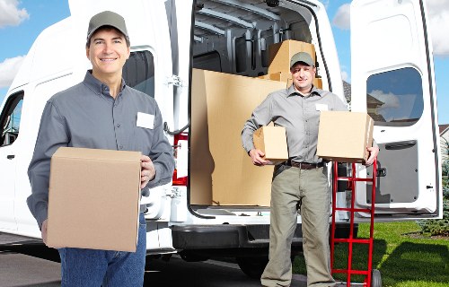 Careful unpacking service organising boxes in a Wandsworth property