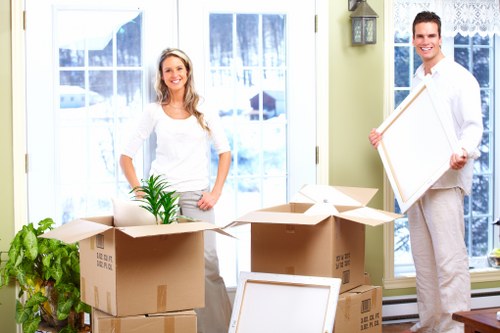 Organised moving boxes and household furniture ready for transport in Wandsworth